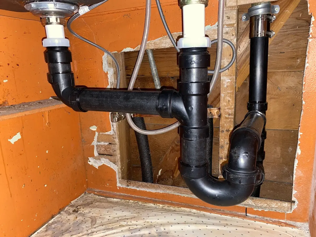 Professional Garbage Disposal Repair equipment and tools on the job in Slinger